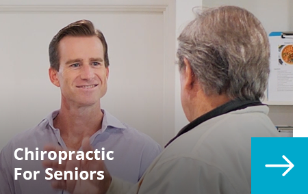 Karrinyup Chiropractor Dr Barry Smith providing consult to elderly man